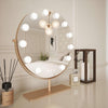 gold round hollywood mirror with 12 bulbs